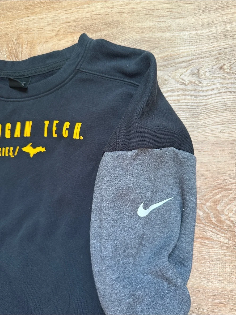 Nike Michigan Tech Huskies Black Pullover Sweatshirt with Yellow Lettering